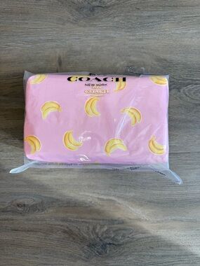 COACH Pink Banana Print Pouch with Gold Logo